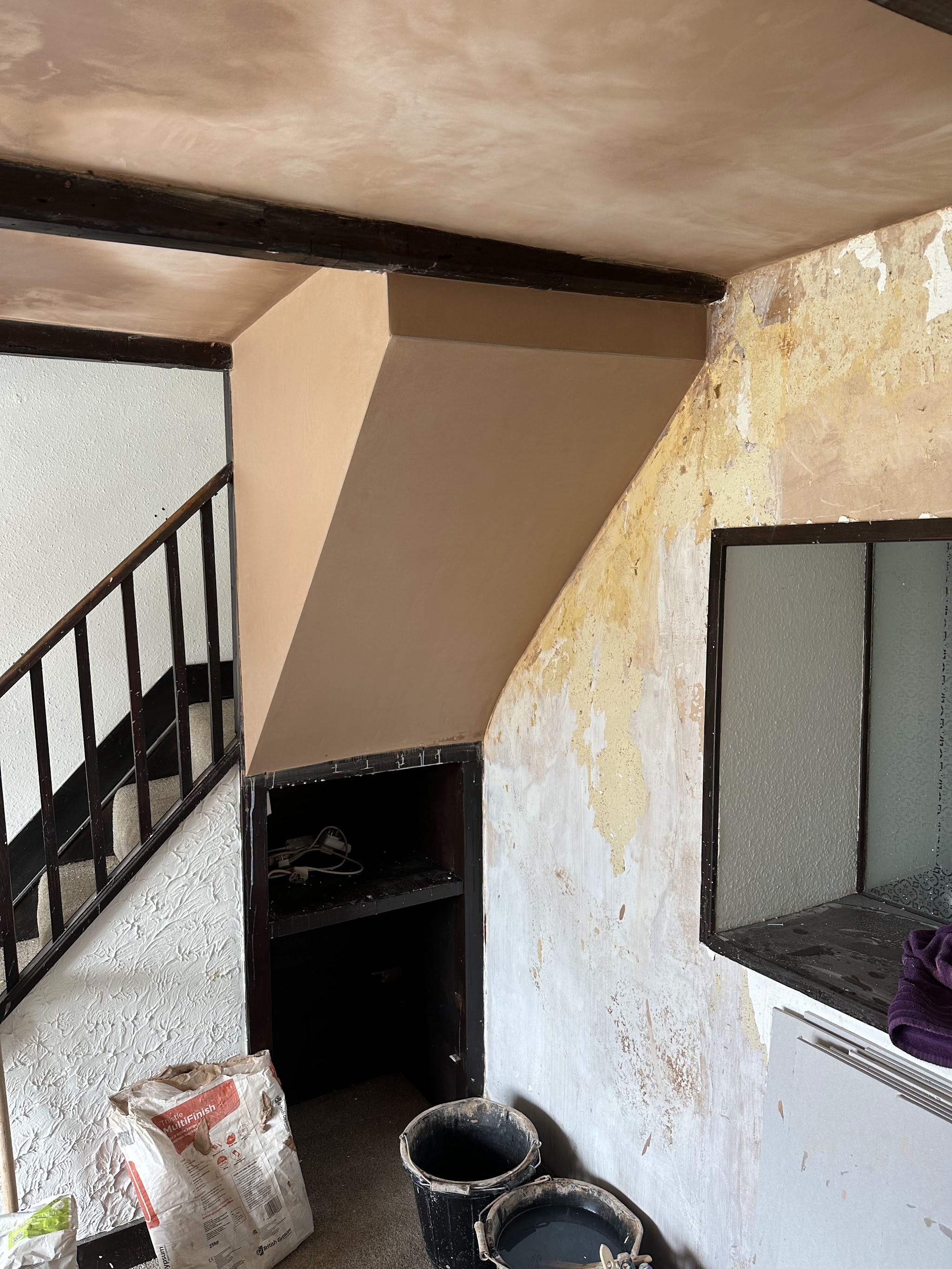 Plastered stairwell and ceiling with original beams, work in progress